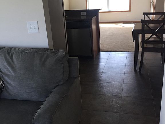 1st floor view from back room to front room, furniture not i