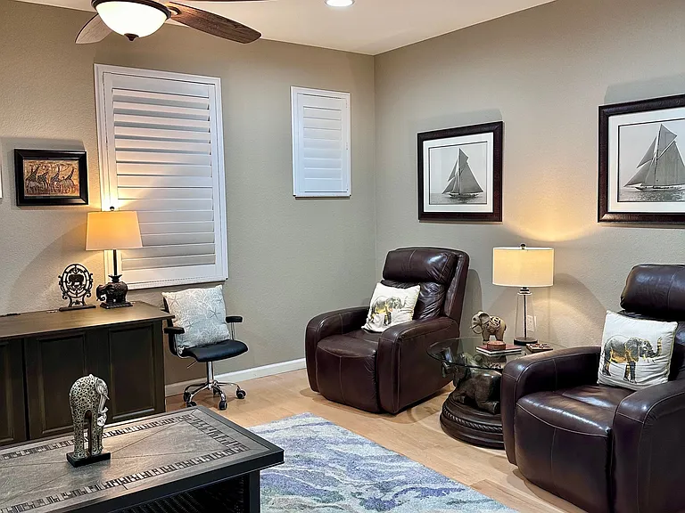 Third bedroom doubles as a comfortable den with additional big screen tv and a queen murphy bed/desk.