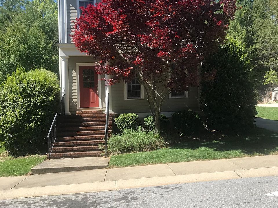 Front of house with beautiful Japanese Maple tree