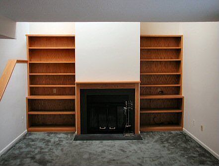 Fireplace with built-in shelves