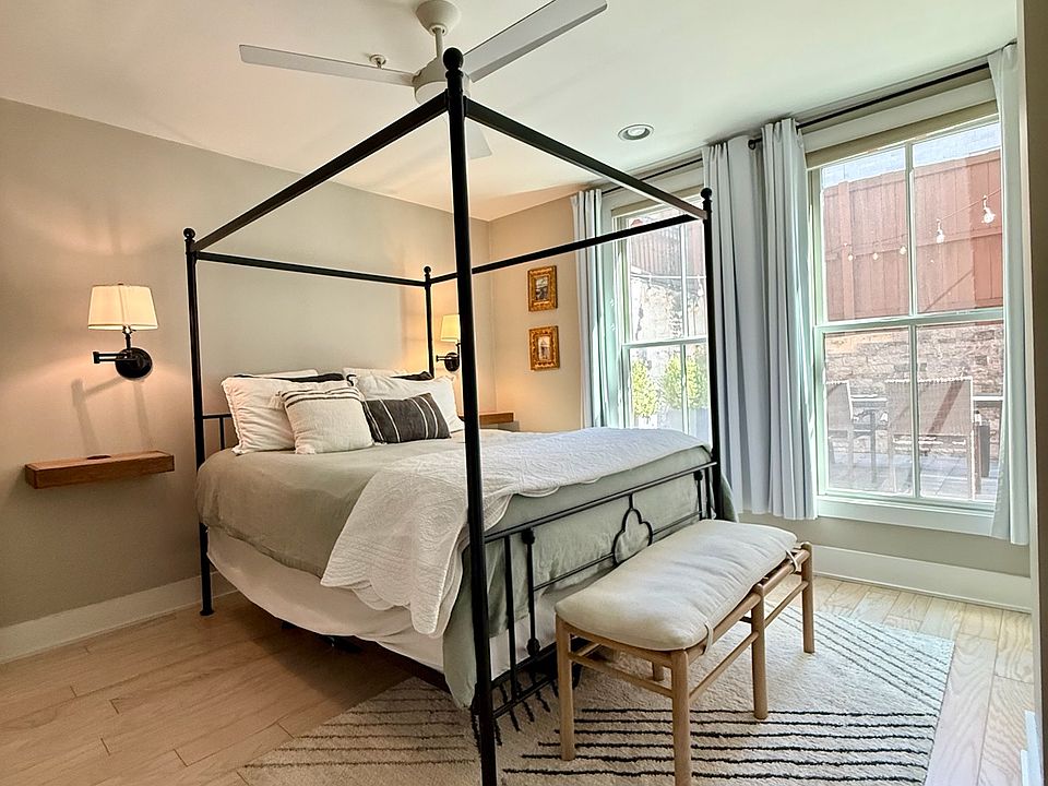 Master bedroom - 2 closets, full bath, floor to ceiling windows overlooking private backyard