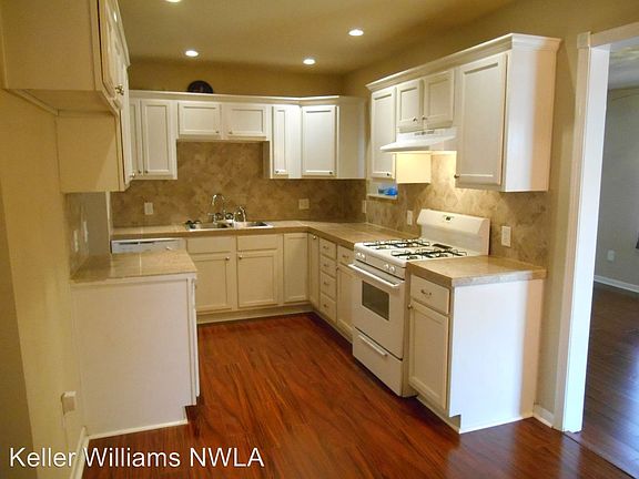 4th image of 9410 Normandie Dr