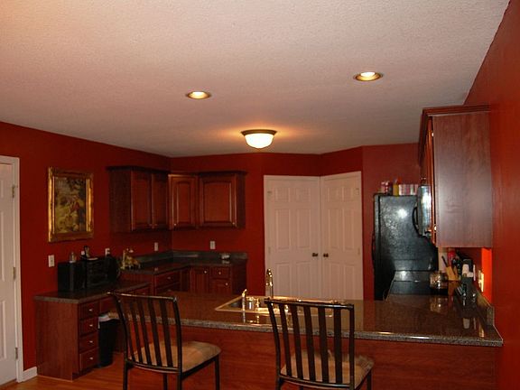 Kitchen with cherry cabinets