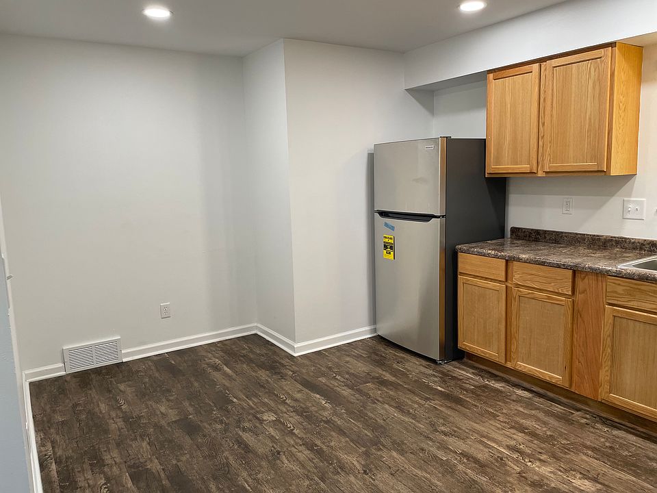 Kitchen is large and spacious with lots of room for a table in the kitchen.