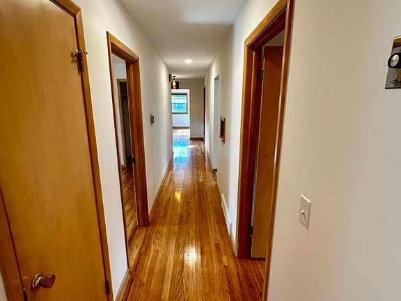 hallway - beautiful refinished floors and freshly painted