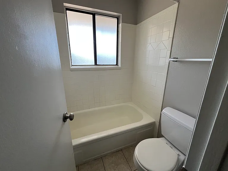 Bathroom of a different unit, but gives you the idea of what they look like. Sink is outside of the bathroom.