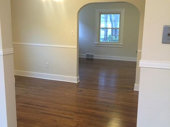 View from kitchen into dining room and living room.