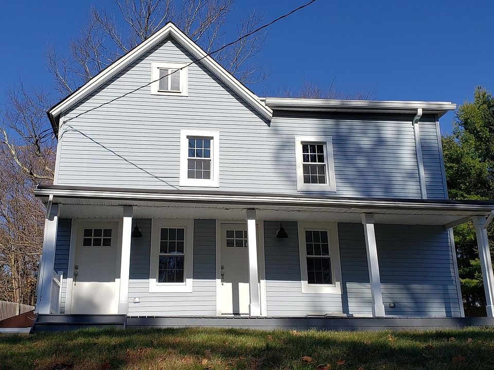 Front view. Door on right. Apartment on first floor.
