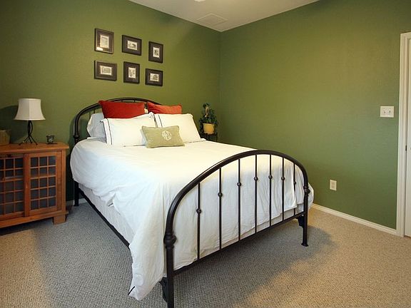 Nice sized Guest bedroom with new carpet that was just installed.