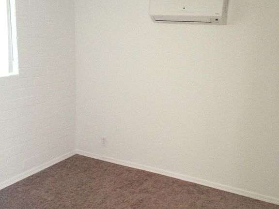 East bedroom with A/C unit