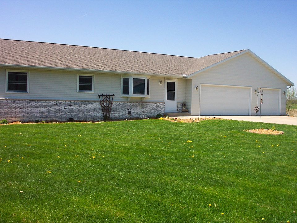 Front Of Home - 3 car garage
