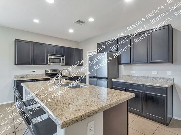 5th image of 8431 N Mountain Stone Pine Way