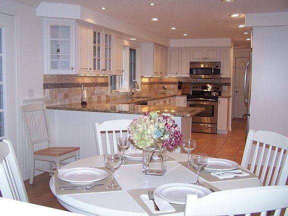 cozy dining room opens to kitchen