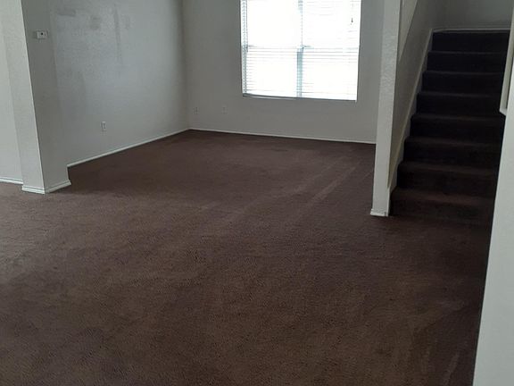 Living Room leading to upstairs