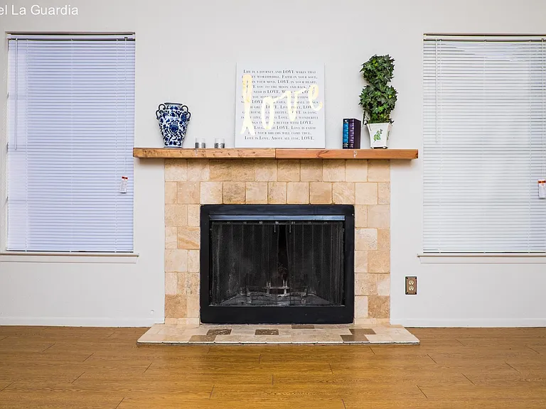 Family room with fire place and mantel