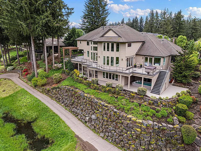 Aerial - Golf course side of home-- shows pool under cover