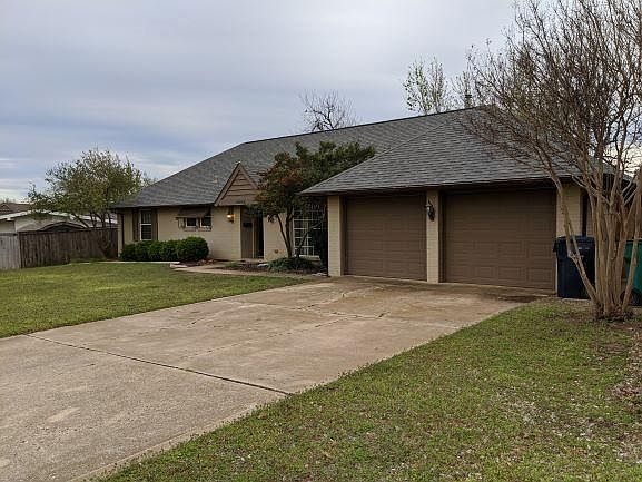 Garage and Front of House. Landscaping pending.