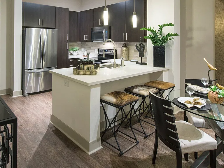 Granite and quartz countertops and stone backsplashes