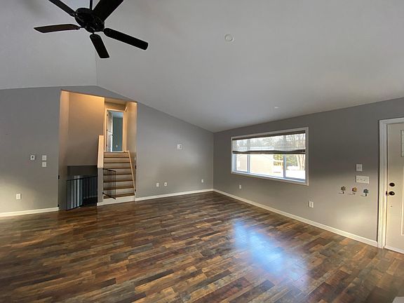 Upstairs open concept living, front door