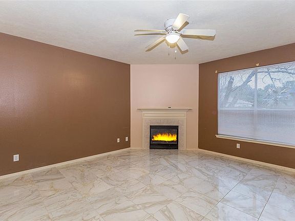 Dining Room or can be whatever you want it to be! Warm, cozy fireplace.