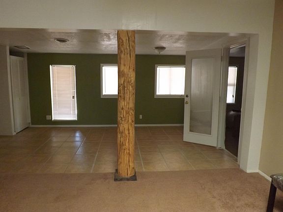 Carpenters living room/tiled dining room
