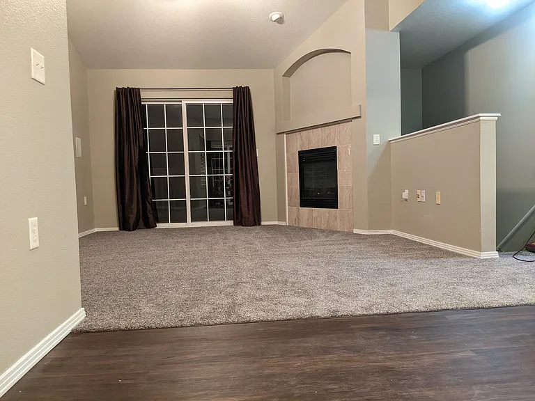 Living room and entrance from downstairs on the right