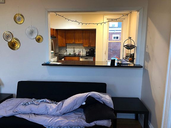 Kitchen Bar with view of kitchen from living room