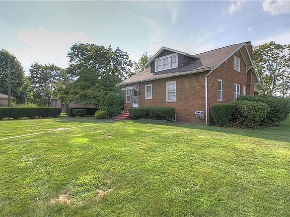 Level back yard!  Ready for a garden, playset, outdoor patio and more!