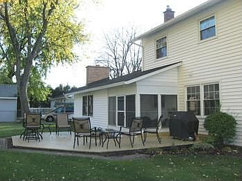 A sprawling back deck adds to the attractiveness of this home