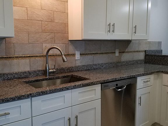 Kitchen with granite and stainless