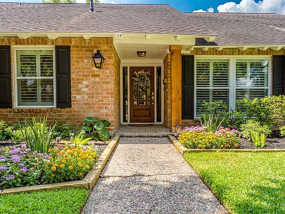 Fresh, colorful landscaping surrounds the home! New gas light and cedar post installed April 2018.