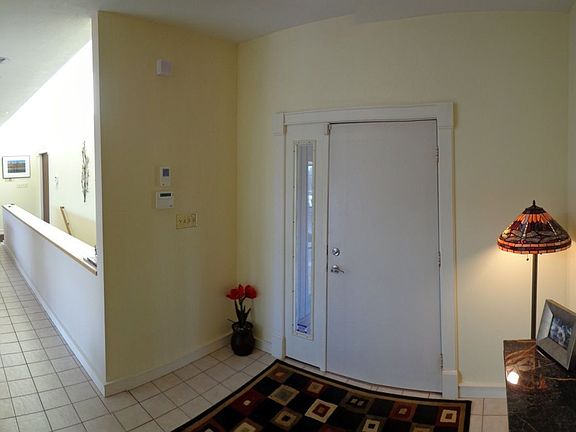 Here is the Foyer, to the left  is the stairway lit by clerestory windows. 