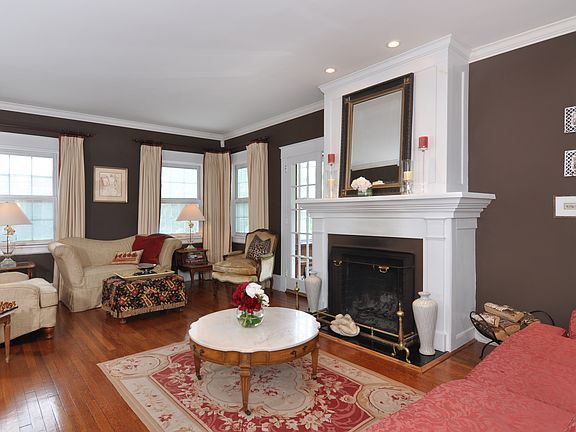 Large living room with wood burning fireplace