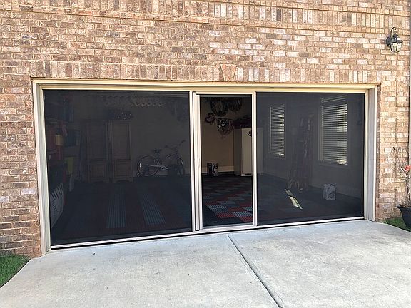 Pull down garage screen