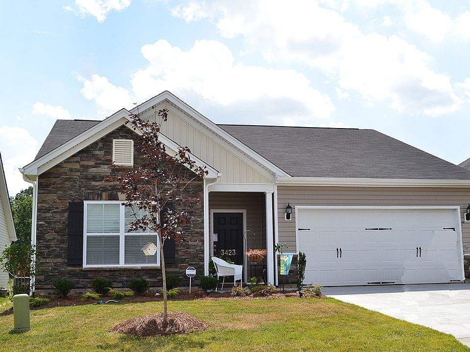 This one story home features a luxurious master su