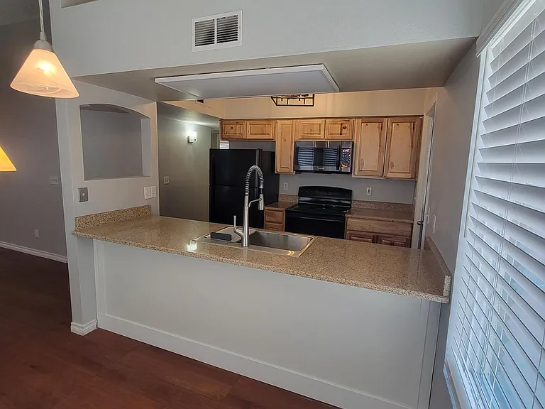 View of kitchen from dining area.