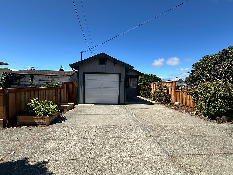 Deep setback offers privacy & curb appeal in quiet Belding Woods.