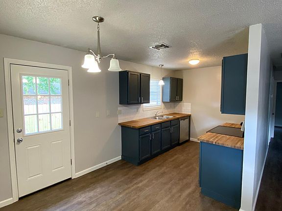 Eat in kitchen with access to large, fully fenced backyard
