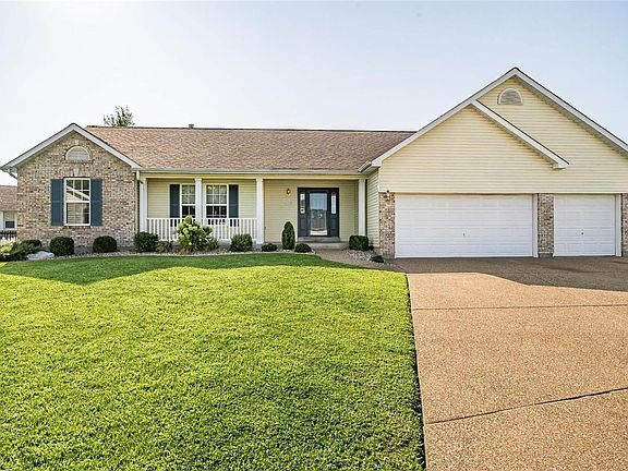 1970 Royal Heir Drive features a 3 car over sized garage on a cul-de-sac with an over-sized driveway!
