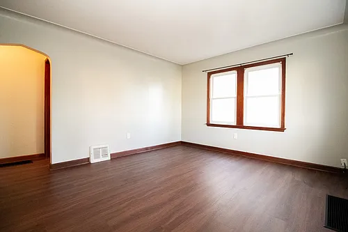 Beautiful One-Story 2BR Home in W Toledo! New Hardwood Floors, Enclosed Back Porch, Remodeled Bat... — Photo 3