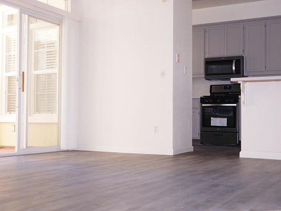 Dining are with patio and kitchen view