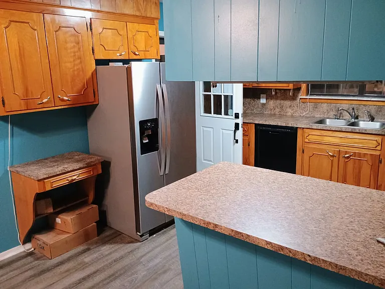 Kitchen with Refrigerator with Icemaker
