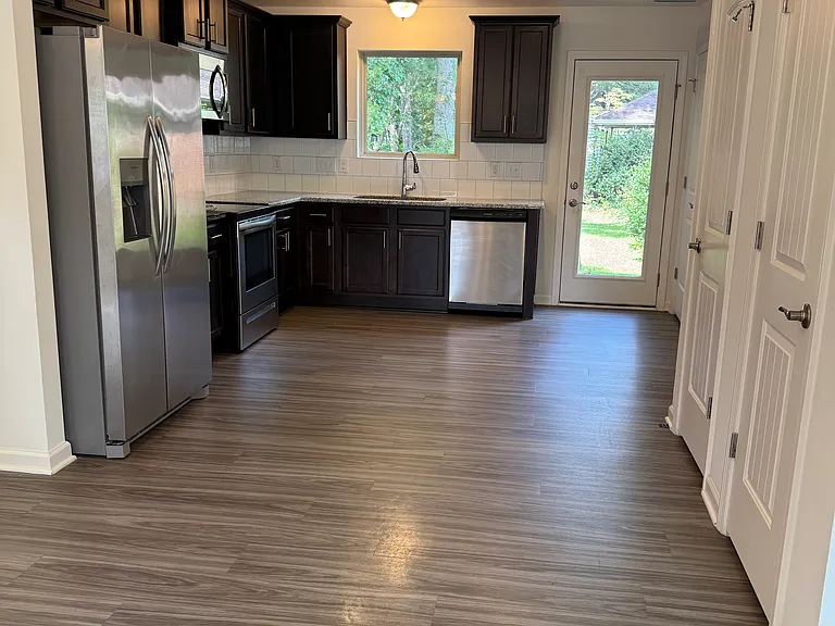 View from living room to kitchen. Open concept.