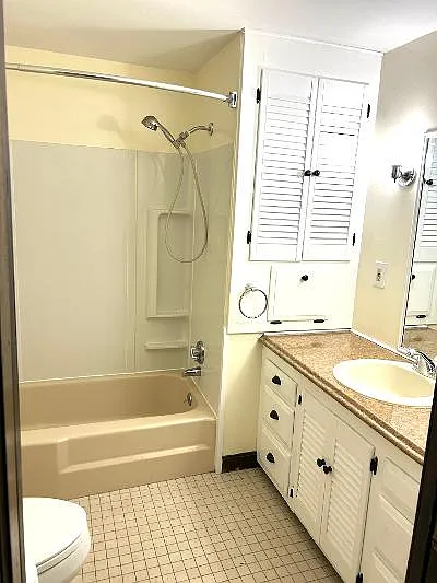 Bathroom, large and freshly painted.