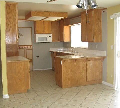 The kitchen has a breakfast bar