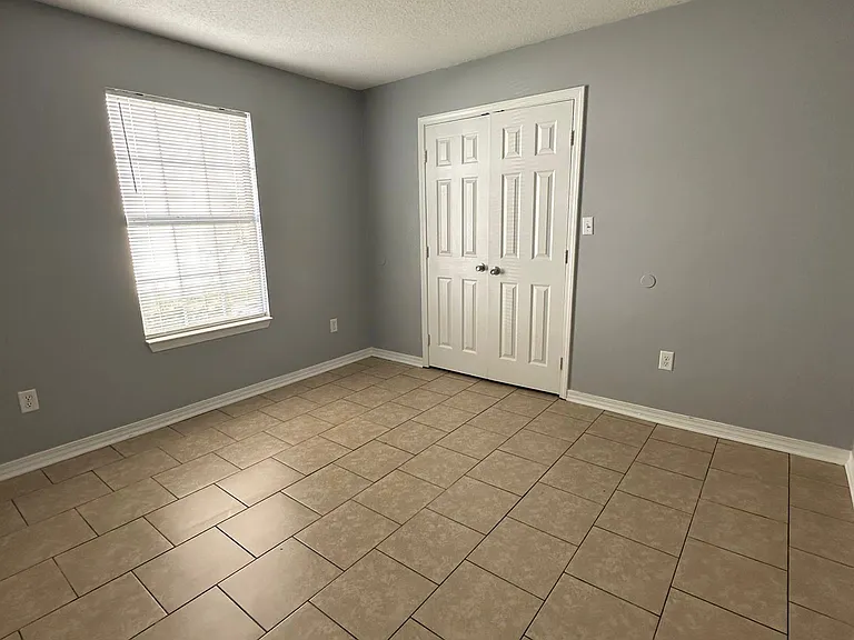 2 of 3 bedrooms. This bedroom shares a bathroom with bedroom 1.