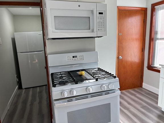 Kitchen with pantry/fridge alcove