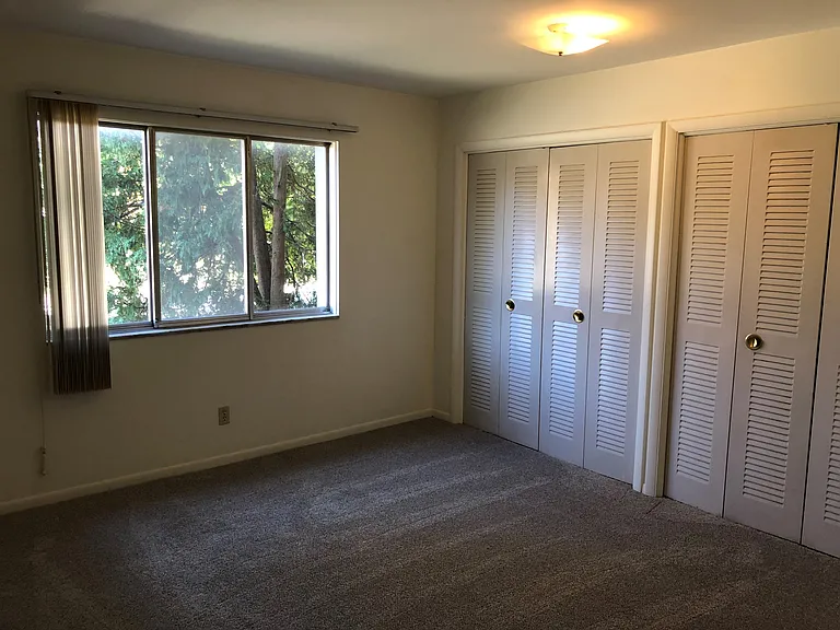 Bedroom 2 with two closets.