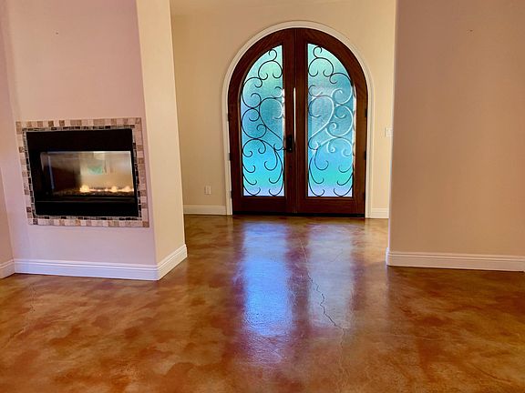 Entry door with fireplace.