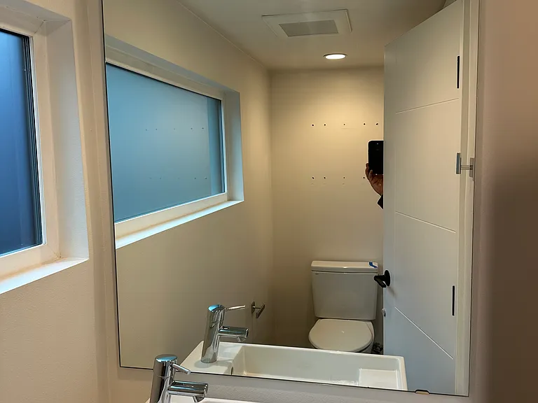 Bath off kitchen.